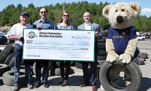 Presenting this year's donation to The Sunshine Foundation. From left: Ron Cayer of Rock City Auto Supply, Steve Fletcher of OARA, Heidi Spannbauer of The Sunshine Foundation and Andrew Horsman of OTS.