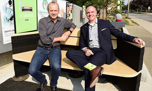 Councillor Mike Layton and Ontario Tire Stewardship Executive Director, Andrew Horsman test The Shaw Bench.